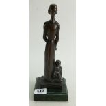 A bronze figure of a mother and child: o