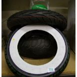 A quantity of tyres and a towing rope.