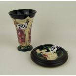 Moorcroft Foxglove pattern vase: 16cm in height (seconds in quality) boxed and a Moorcroft framed