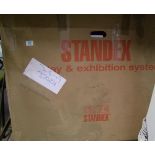 A boxed System Standex display/exhibition stand.