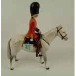 Duke of Edinburgh mounted on grey horse (reins are missing)