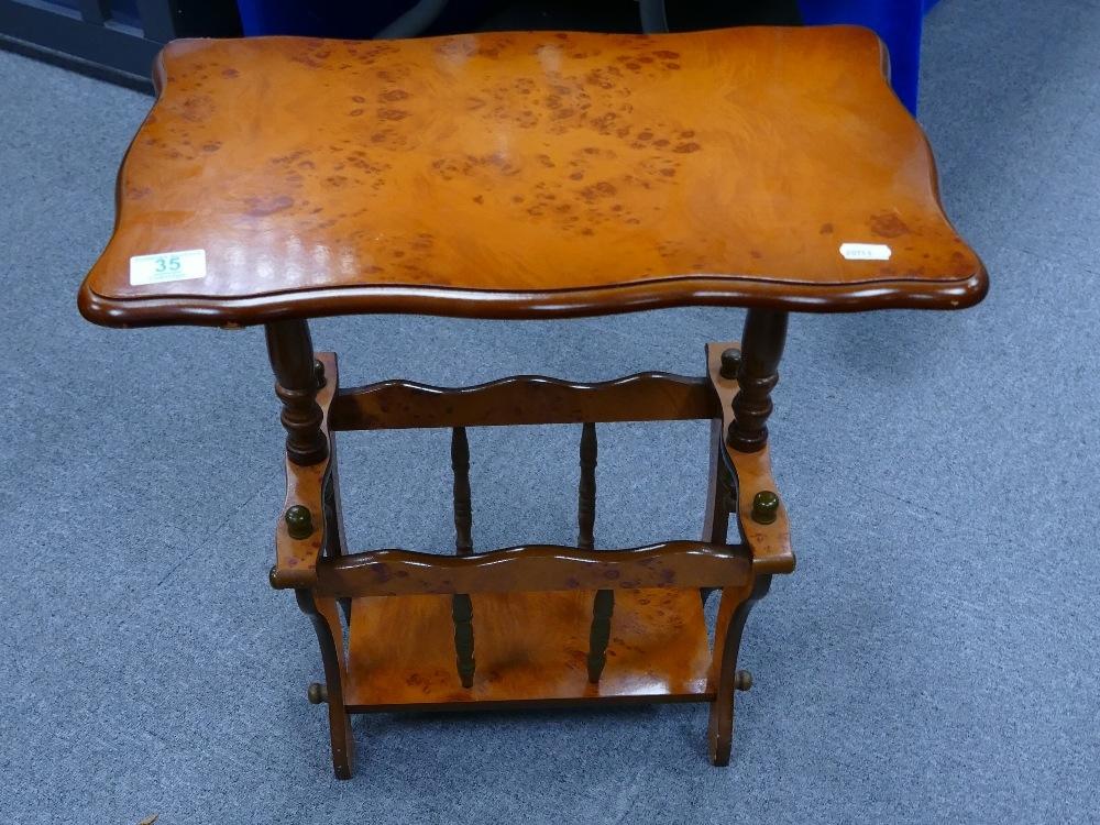 A reproduction walnut effect magazine rack: