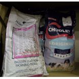 Two large bags of dog food: together with a similar bag of dog food.