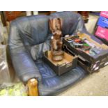 A two seater oak framed blue leather sofa: