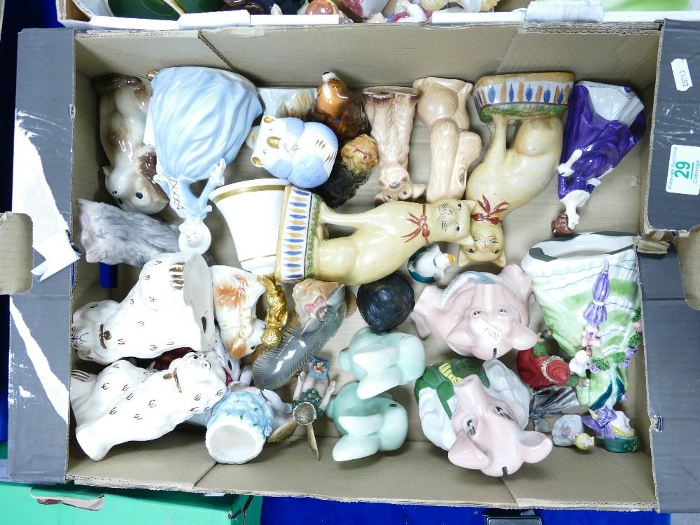 A mixed collection of items to include: Wade natwest pigs, minton animal figures, sylvac dogs,