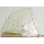 Mother of Pearl Fan with lace decoration: Supported by bone struts 28cm not including hoop.