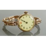 Ladies 9ct gold Watch with 9ct gold expandable bracelet: Gross weight 21.9 grams.