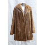 A Brown Mink fur ladies Coat: Size 14 / 16, three quarter length.