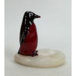 Royal Doulton Flambe model of a Penguin Chick: Mounted on an oval marble dish, height 13.5cm.