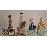 A group of Goebel figurines to include: A lady with floral dress and hat,