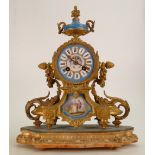 French Louis gilt on metal French Mantle clock: Decorated with Limoges type panels to face and