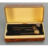 15ct Victorian gold Tie Pins: Set with various precious stones. 5.1 grams.
