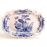 Tin glazed Delft oval Dish: Minor chip to reverse and small paint losses front & back. 31.5cm wide.