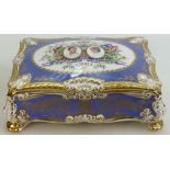 A Paragon commemorative Cigar Casket: Gilded and decorated with the Marriage of Prince of Wales &