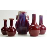 A collection of Chinese pottery in Flambe glazes: Comprising pair of bottle shaped vases,
