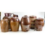 A collection of Stoneware large Jugs and Spirit Barrels: Vine decoration noted to barrel items,