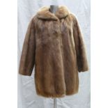 A blonde Mink fur ladies Jacket: Size 12, three quarter length.