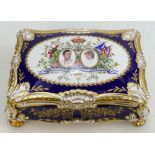 A Paragon commemorative Cigar Casket: Gilded and decorated with the Marriage of Prince of Wales &