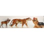 Goebel figures to include: A large Bengal tiger, Yorkshire terrier and a moose.