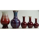 A collection of Chinese pottery Vases in Flambe glazes: Comprising vase in red /blue glaze,
