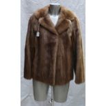 A Blonde Mink fur ladies Jacket: Size 10.