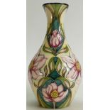 Moorcroft Trial Vase: Decorated with pink flowers on a yellow background.