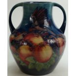 Moorcroft two handled large Vase: Decorated in the Finch & Berry design, height 33cm.