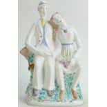 Wedgwood Arnold Machin figure group of a seated couple Country Lovers: Artist initials TM,