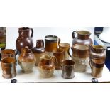 A collection of Stoneware Jugs and Tankards: 14 items, tallest 32cm.