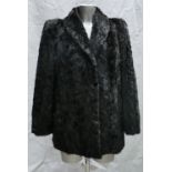 A black Mink fur ladies Jacket: Size 12.