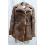 A Coney fur ladies Jacket: Size 14 light brown.