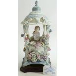 Lladro large figure group Gazebo in bloom: A large Lladro floral figure group of Lady in floral