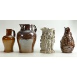 A collection of Stoneware Jugs and a similar Bacchanalian item: Height of tallest 23.5cm.