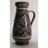 Doulton Lambeth Stoneware Jug: Decorated with scrolling foliage and sea shells by Emily Stormer,