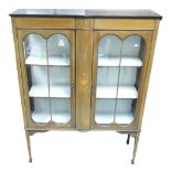 Edwardian Mahogany Inlaid 2 door display Cabinet: On tapered legs.