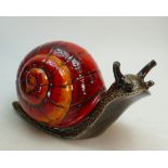 Anita Harris Art pottery model of a Snail: In orange/ brown colourway, height 21cm x 39cm long.