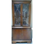 20th century Astragal glazed Mahogany Bookcase: With 2 door base.