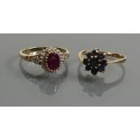 Two 9ct rings: Red & white stone cluster ring, and a Sapphire cluster. Total weight 4.