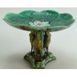 19th Century Majolica Tazza / Comport: The base moulded with three cranes and the top with water