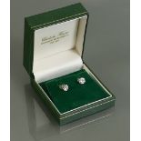 Pair 18ct white gold Solitaire Diamond Earrings: Each diamond approx.