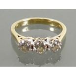 18ct three stone diamond Ring: Unmarked but tested for 18ct gold ring set with 3 diamonds, approx .