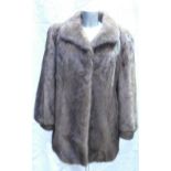 A Brown Mink fur ladies Jacket: Size 14.