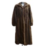 A Mink fur ladies Coat: Size 12/14, full length.