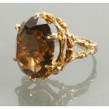 9ct set large Smokey Quartz Ring: Size 10 Cairngorm / smokey quartz single stone measuring 22mm x