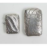 Two unusual silver Vesta cases: The oversize larger one measuring 6.