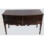 19th century bow fronted Sideboard: Inlaid mahogany with section of veneer missing.