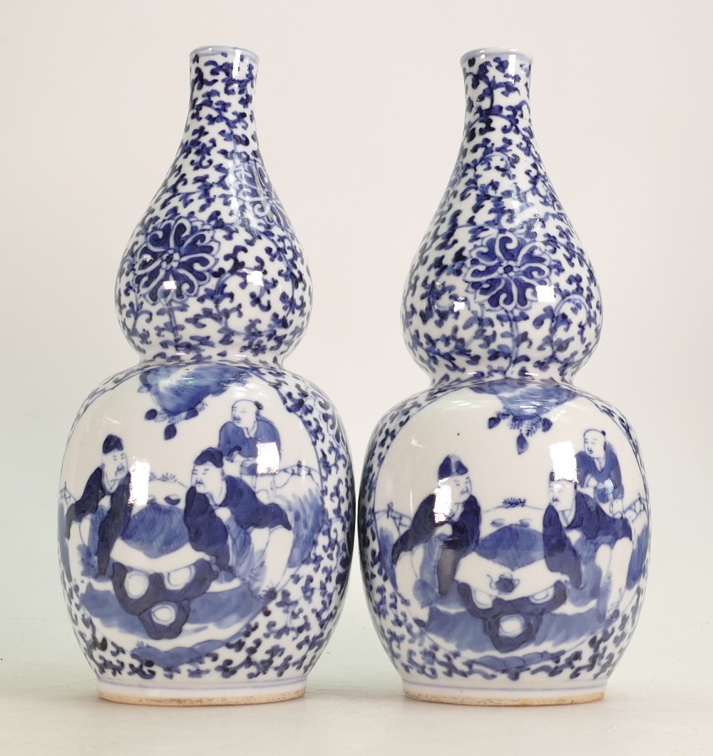 A pair of 19th century Chinese Double Gourd Vases: 4 character mark to base, 26cm high.