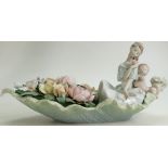 Lladro figure River of Dreams : A large Lladro floral figure of a lady and child in a floral boat,