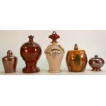 A collection of five pottery Money boxes: Including Salt, Majolica and Treacle glazes.