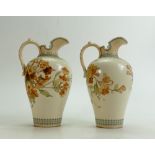 Pair Doulton Lambeth Ewers: Decorated with autumn flowers and leaves, initialled FM to the base,